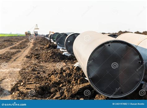Laying Gas Pipelines in the Field Stock Photo - Image of pipeline, work ...