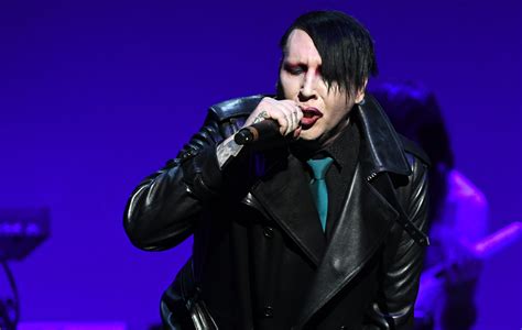 Band opening for Marilyn Manson respond to backlash before deleting ...