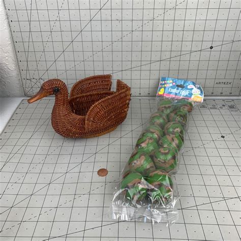 #173 Duck Basket & Camo Easter Eggs | EstateSales.org