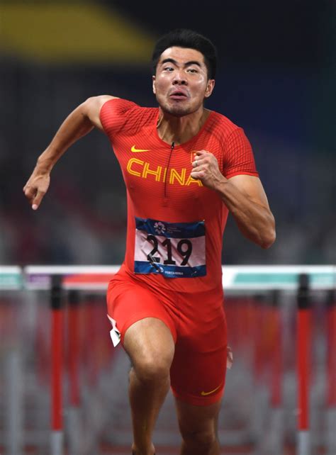 高清图：亚运男子110米栏决赛 谢文骏夺冠卫冕-搜狐大视野-搜狐新闻