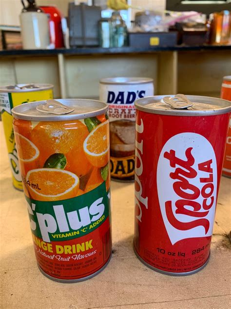 9- Assorted Vintage Soda Cans - Schmalz Auctions