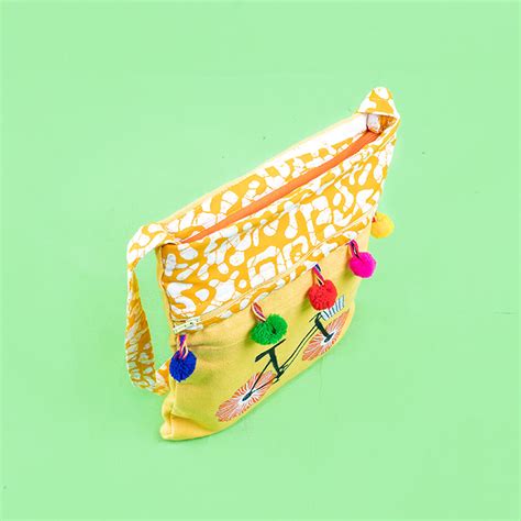 Buy Yellow Cycle Cotton Sling Bag Online On Zwende