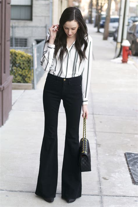 Buy outfits with black flare pants - In stock