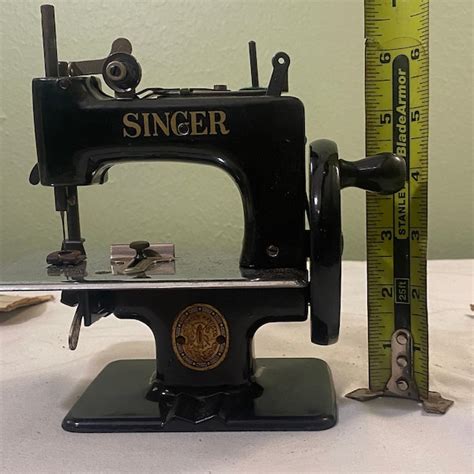 Image result for Singer Child Sewing Machine Instructions
