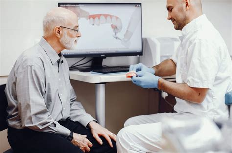 Learn the Pros and Cons of Dentures and Dental Implants