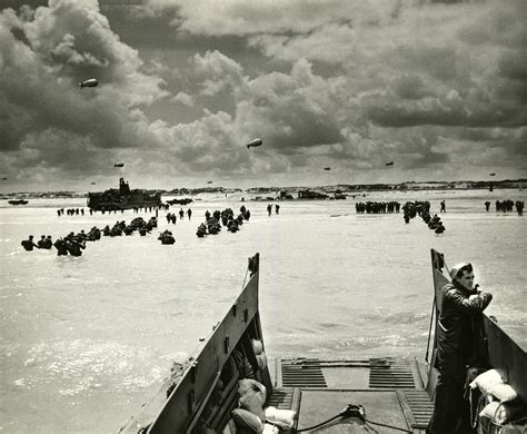 US forces gathering on a Normandy beach after D-Day, France, 1944 | The ...