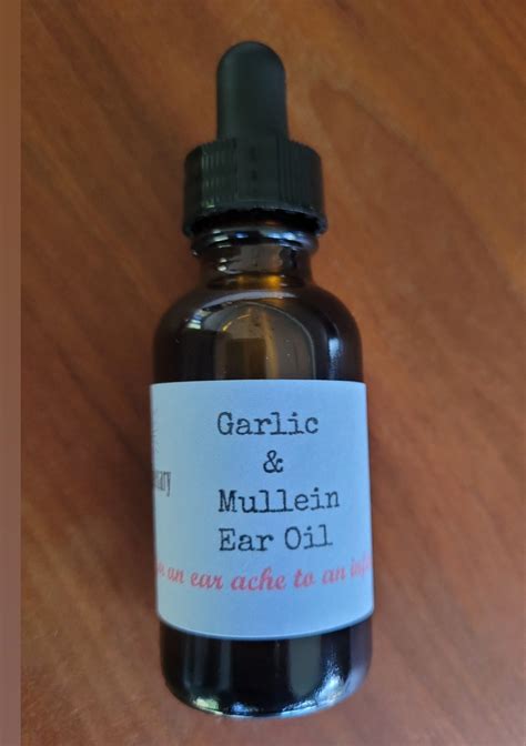 1 oz Garlic/Mullein flower Ear oil - for ear aches and infections ...