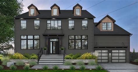 gray painted brick house with black trim - Carman Delvalle