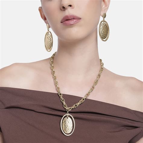 Buy Gold Tone Dual Oval Design Beaten Gold Necklace Set – Estele
