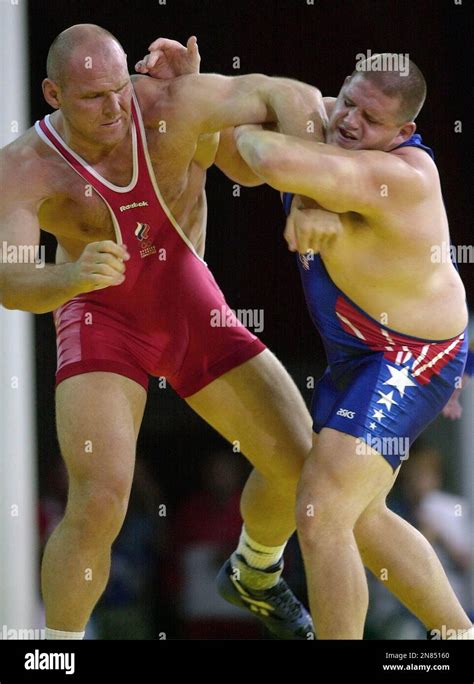 FILE - In this Sept. 27, 2000 file photo, Rulon Gardner, right, of the ...
