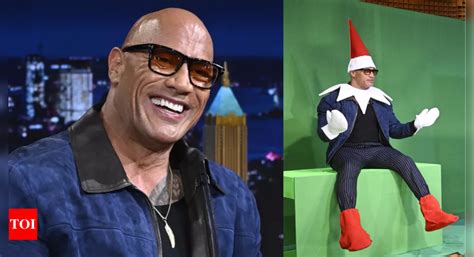 Dwayne Johnson transforms into a miniature 'Elf on the Shelf' to answer ...