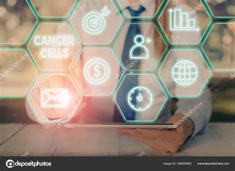 Handwriting text Cancer Cells. Concept meaning forming solid tumors or ...