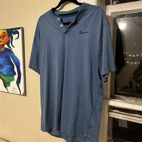 Nike collarless golf shirt. Dri fit. Tagged L fits... - Depop