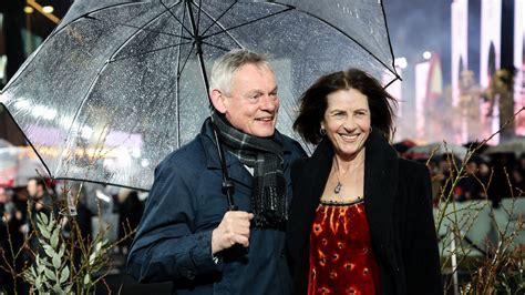Martin Clunes turns rare red carpet appearance into date night with ...
