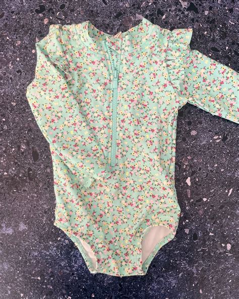 Cotton On green floral swimming costume 6/12M – Nearly New Kids