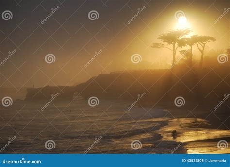 Santa Cruz Sunset in the Fog Stock Photo - Image of glowing, waves ...