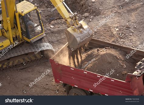 Image result for Large Excavators Loading Trucks
