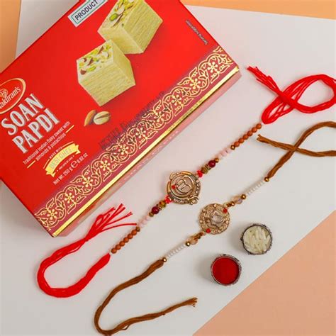 Send Two Punjabi Style Rakhi With Soan Papdi Online