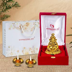 INTERNATIONAL GIFT Gold Plated Cymbal Ganesh Idol Statue With 2 Diya ...