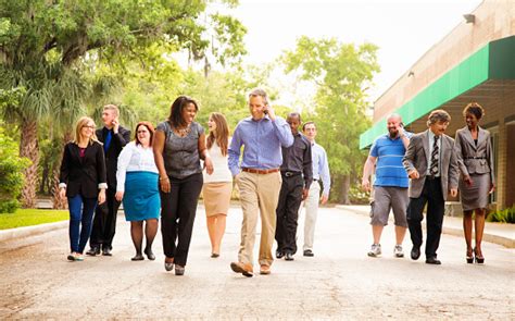 People Walking around a Work Site 的图像结果