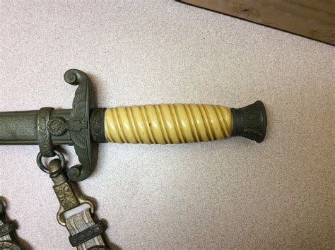 Image result for Dagger Handle