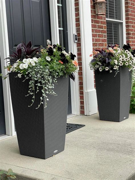 Pin by Lena Williams on Gardening | Porch flowers, Porch planters ...