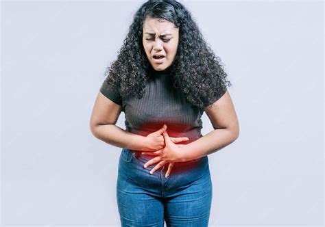 Young woman suffering stomach pain people with stomach pain isolated ...