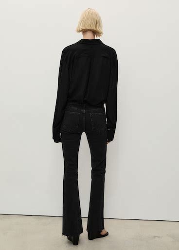 Fiona flared mid-rise jeans - Women | MANGO USA