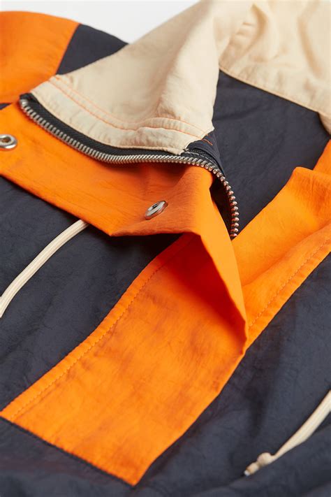 Foldable popover jacket - Navy blue/Orange - Ladies | H&M IN
