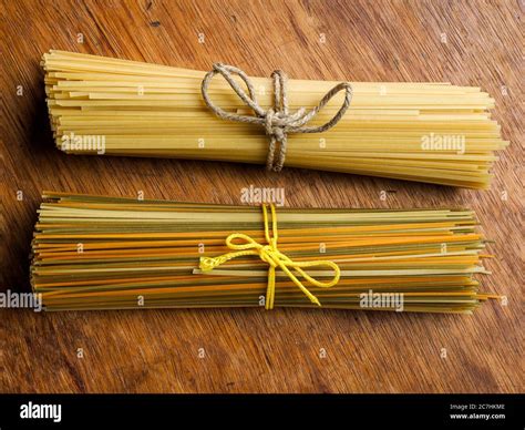 Durum wheat spaghetti in three colors Stock Photo - Alamy