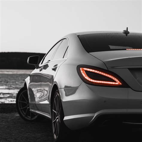 Download wallpaper 1280x1280 car, headlight, rear view, sports car, bw ...