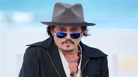 Johnny Depp's new dramatic transformation includes silver hair and blue ...