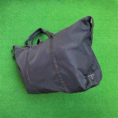 Prada Duffel Bag, Women's Fashion, Bags & Wallets, Tote Bags on Carousell