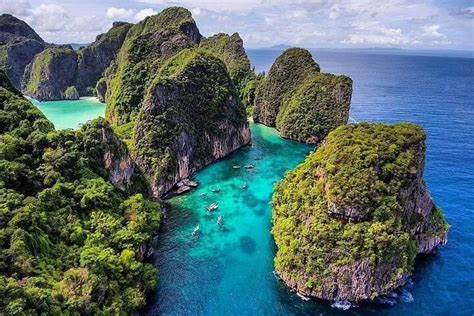https://images.thaiholidayguide.com/images/tours/private-phi-phi-and-khai-islands-snorkeling-tour-by-speedboat.webp