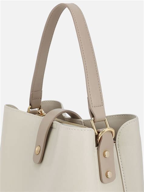 Margo Off-White Handheld | IRTH | House of Titan | Shop Online