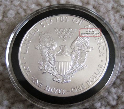 1996 American Silver Eagle In Capsule. And. One Ounce
