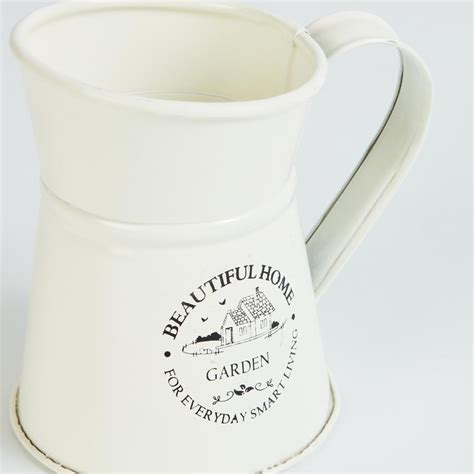 Buy Beautiful Home Metal Water Can from Home Centre at just INR 249.0