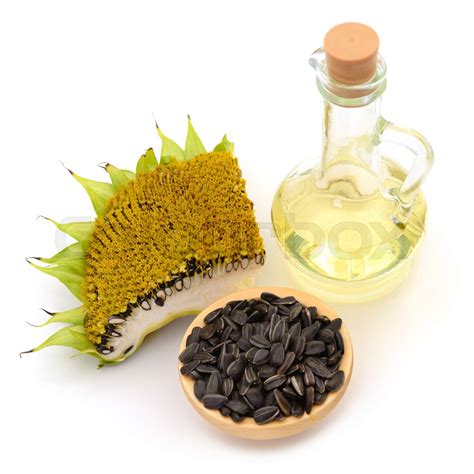 Sunflower seeds and oil. | Stock image | Colourbox