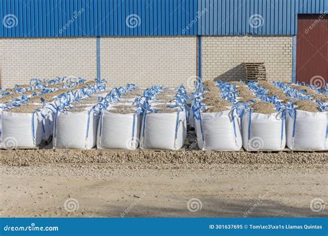 A Pile of Bags of Gravel and River Sand Stock Image - Image of stone ...