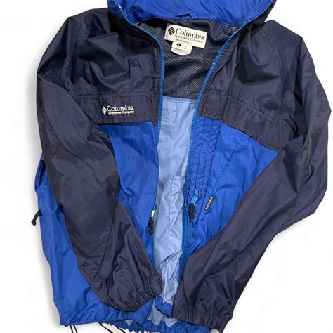 Large blue and navy Columbia windbreaker jacket... | Depop