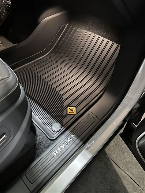 All weather floor mats logos are black | Rivian Forum - R1T R1S R2 R3 ...