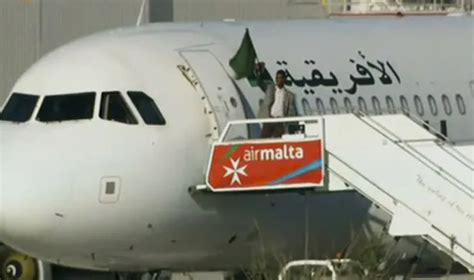 Plane hijacked, lands in Malta; almost all hostages released - India TV ...
