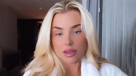 Glamorous footballer Madelene Wright puts on busty display in black bikini and bathrobe | The US Sun