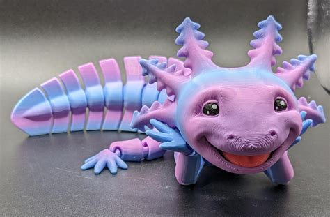 I was told y'all might appreciate my 3D printed axolotls, so here are ...