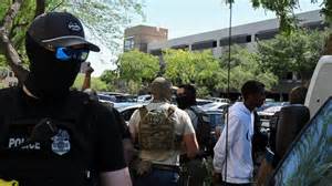 What we know: Are ICE agents allowed to be masked?