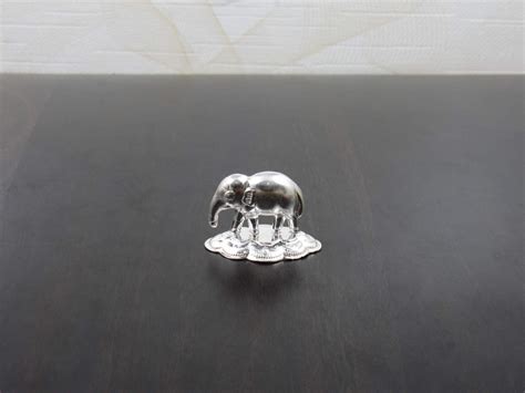 Buy GoldGiftIdeasPure Silver Elephant Idol with Potli Bags - 4 x 3.5 cm ...