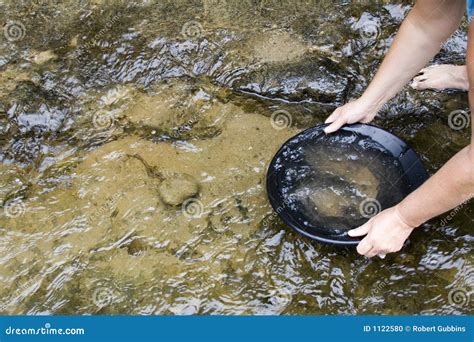 Gold panning for gold stock photo. Image of hand, geology - 1122580