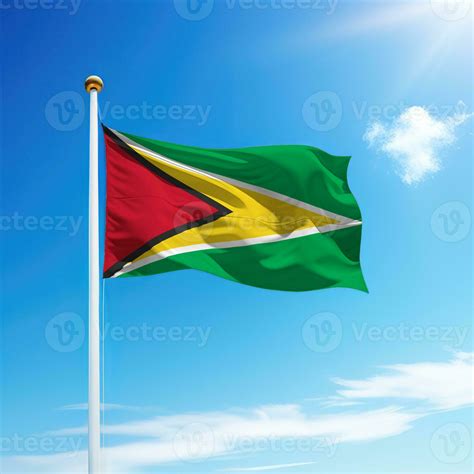 Waving flag of Guyana on flagpole with sky background. 30608820 Stock ...