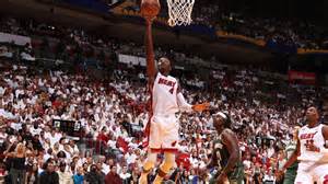 Heat's Oladipo exits with left knee injury; team awaiting tests - ESPN