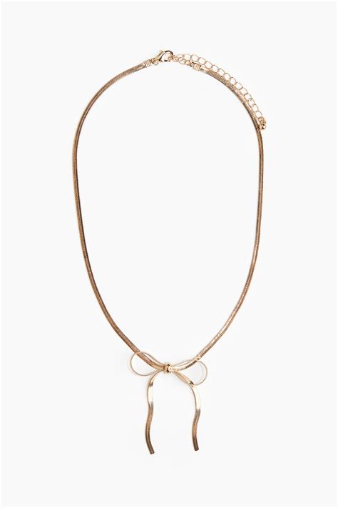 Bow-detail necklace - Gold-coloured - Ladies | H&M IN